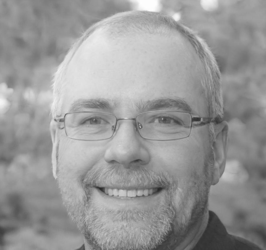 Portrait professionnel de formateur expert en modèles économiques